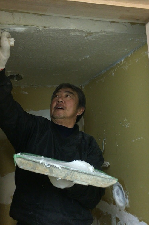 左官工事 岡崎久仁男